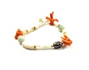Bracelet plaqué or élastique, nacre, corail et pierres