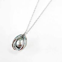 Collier Acier Cage et Perle de Tahiti