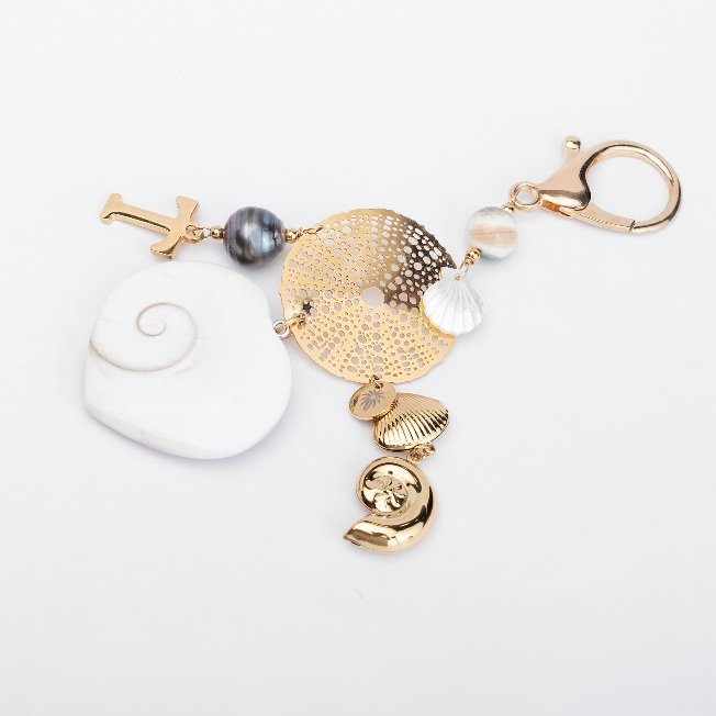 PORTE-CLES / BIJOUX DE SAC MOANA - ACIER DORE
