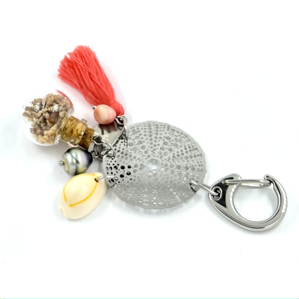 Porte clés acier pompon bouteille Sable
